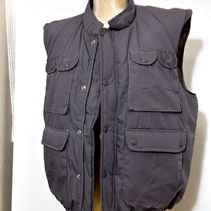 Outerwear flannel lined Vest.
Size Large Utility  Zip  plus Snap Up extra warm
